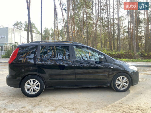 Черный Мазда 5, объемом двигателя 2 л и пробегом 200 тыс. км за 3600 $, фото 4 на Automoto.ua