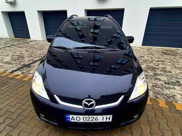 Черный Мазда 5, объемом двигателя 2 л и пробегом 221 тыс. км за 5300 $, фото 1 на Automoto.ua