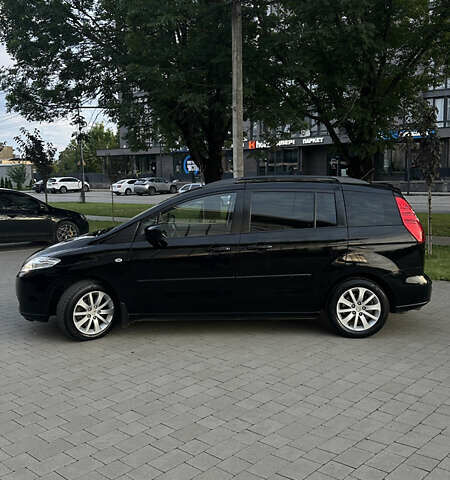 Черный Мазда 5, объемом двигателя 2 л и пробегом 221 тыс. км за 6800 $, фото 1 на Automoto.ua