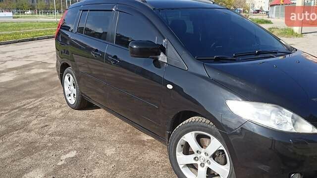Черный Мазда 5, объемом двигателя 2 л и пробегом 298 тыс. км за 7000 $, фото 3 на Automoto.ua