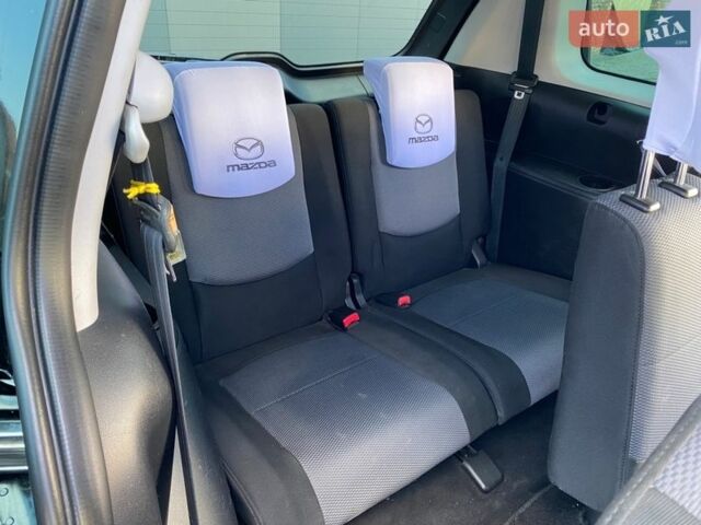 Черный Мазда 5, объемом двигателя 1.8 л и пробегом 250 тыс. км за 4500 $, фото 10 на Automoto.ua