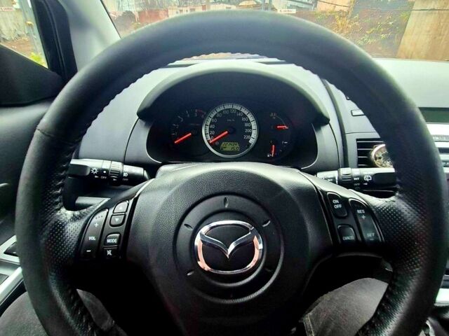 Черный Мазда 5, объемом двигателя 2 л и пробегом 221 тыс. км за 5300 $, фото 7 на Automoto.ua