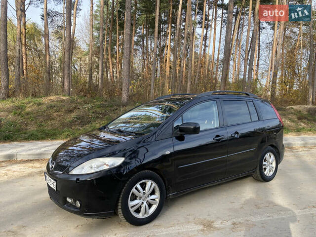 Черный Мазда 5, объемом двигателя 2 л и пробегом 200 тыс. км за 3600 $, фото 1 на Automoto.ua