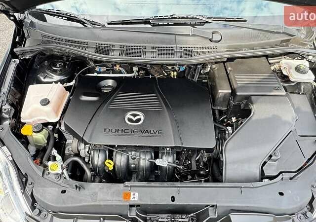 Черный Мазда 5, объемом двигателя 2 л и пробегом 220 тыс. км за 6500 $, фото 39 на Automoto.ua
