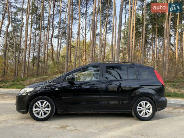 Черный Мазда 5, объемом двигателя 2 л и пробегом 200 тыс. км за 3600 $, фото 5 на Automoto.ua