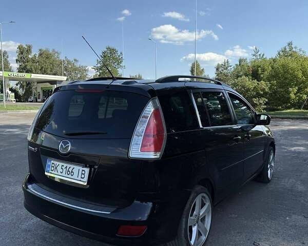 Черный Мазда 5, объемом двигателя 2 л и пробегом 249 тыс. км за 6500 $, фото 3 на Automoto.ua