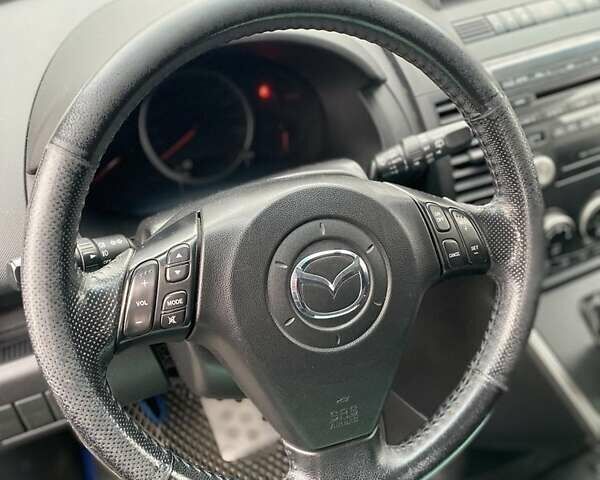 Чорний Мазда 5, об'ємом двигуна 2 л та пробігом 310 тис. км за 5250 $, фото 4 на Automoto.ua
