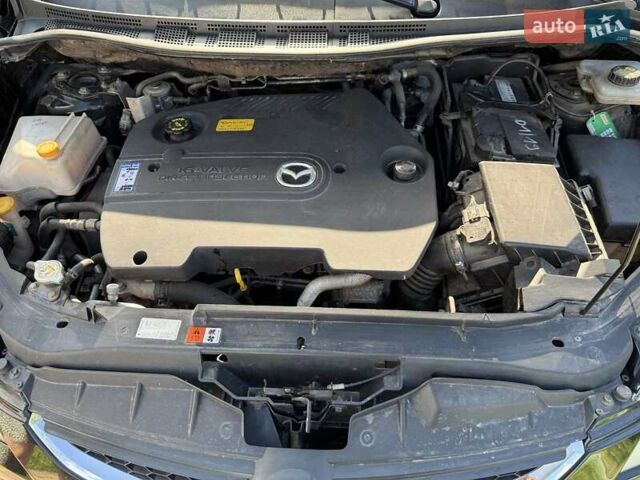 Черный Мазда 5, объемом двигателя 2 л и пробегом 249 тыс. км за 6500 $, фото 26 на Automoto.ua