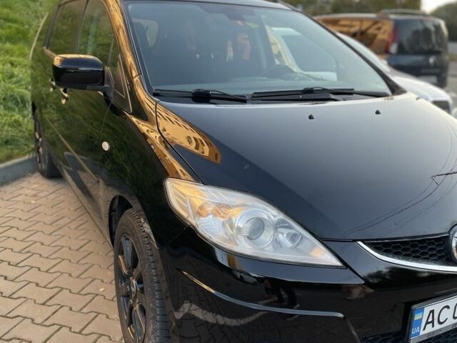Черный Мазда 5, объемом двигателя 2 л и пробегом 325 тыс. км за 6200 $, фото 1 на Automoto.ua
