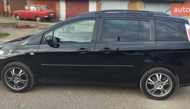 Черный Мазда 5, объемом двигателя 2 л и пробегом 300 тыс. км за 5600 $, фото 2 на Automoto.ua
