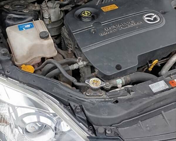 Черный Мазда 5, объемом двигателя 2 л и пробегом 289 тыс. км за 6050 $, фото 1 на Automoto.ua