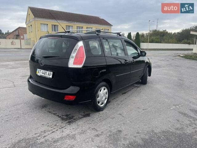 Черный Мазда 5, объемом двигателя 1.8 л и пробегом 302 тыс. км за 4250 $, фото 3 на Automoto.ua
