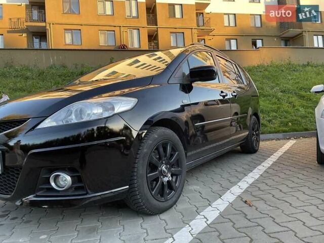 Черный Мазда 5, объемом двигателя 2 л и пробегом 325 тыс. км за 6200 $, фото 1 на Automoto.ua