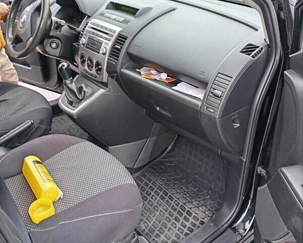 Черный Мазда 5, объемом двигателя 2 л и пробегом 289 тыс. км за 6050 $, фото 5 на Automoto.ua