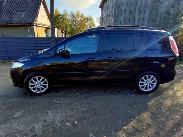 Черный Мазда 5, объемом двигателя 2 л и пробегом 196 тыс. км за 7500 $, фото 1 на Automoto.ua