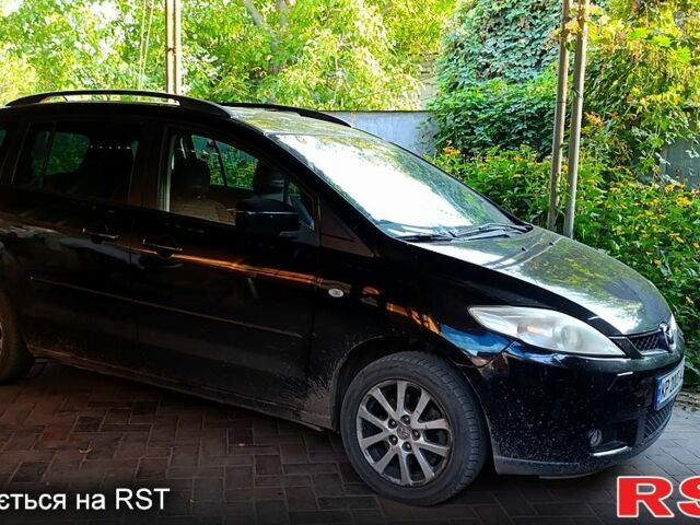 Черный Мазда 5, объемом двигателя 2 л и пробегом 170 тыс. км за 5200 $, фото 1 на Automoto.ua
