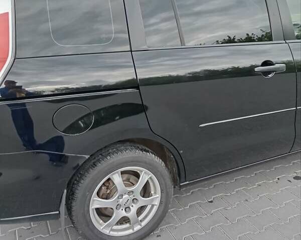 Черный Мазда 5, объемом двигателя 2 л и пробегом 289 тыс. км за 6050 $, фото 9 на Automoto.ua