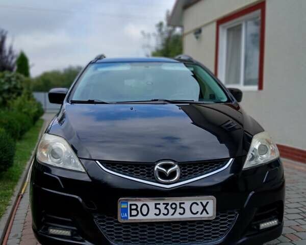 Черный Мазда 5, объемом двигателя 2 л и пробегом 273 тыс. км за 5999 $, фото 1 на Automoto.ua