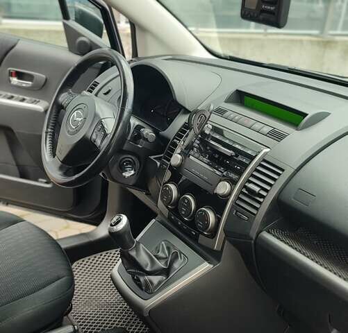 Черный Мазда 5, объемом двигателя 2 л и пробегом 244 тыс. км за 6700 $, фото 2 на Automoto.ua