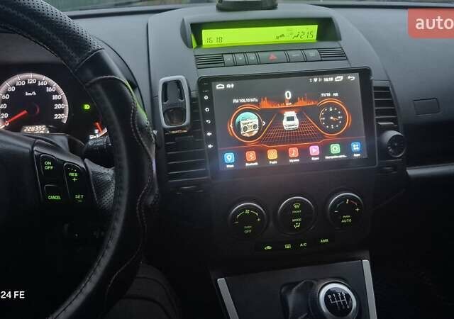 Черный Мазда 5, объемом двигателя 2 л и пробегом 228 тыс. км за 6700 $, фото 37 на Automoto.ua