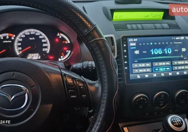 Черный Мазда 5, объемом двигателя 2 л и пробегом 228 тыс. км за 6700 $, фото 39 на Automoto.ua