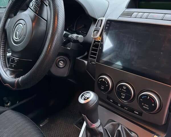 Черный Мазда 5, объемом двигателя 2 л и пробегом 228 тыс. км за 6700 $, фото 16 на Automoto.ua