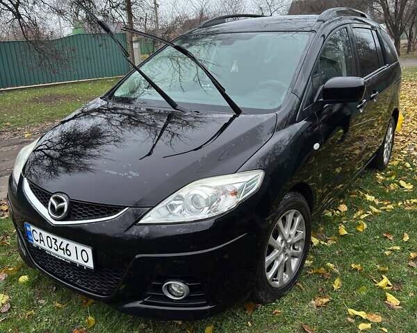 Черный Мазда 5, объемом двигателя 2 л и пробегом 228 тыс. км за 6700 $, фото 24 на Automoto.ua