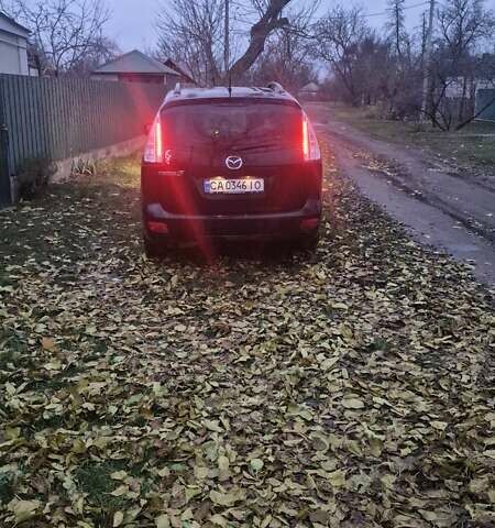 Черный Мазда 5, объемом двигателя 2 л и пробегом 228 тыс. км за 6700 $, фото 26 на Automoto.ua