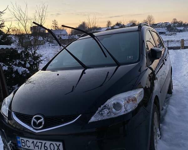 Черный Мазда 5, объемом двигателя 1.8 л и пробегом 173 тыс. км за 8500 $, фото 1 на Automoto.ua