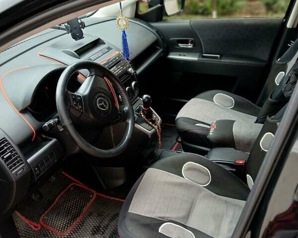 Черный Мазда 5, объемом двигателя 2 л и пробегом 273 тыс. км за 5999 $, фото 11 на Automoto.ua