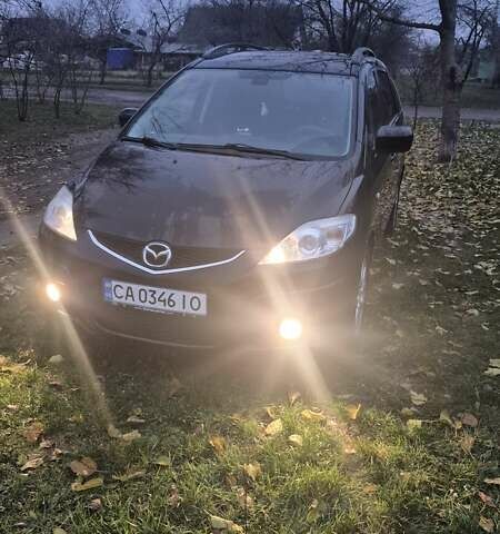 Черный Мазда 5, объемом двигателя 2 л и пробегом 228 тыс. км за 6700 $, фото 29 на Automoto.ua