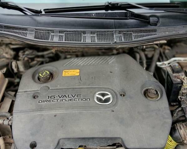 Черный Мазда 5, объемом двигателя 2 л и пробегом 273 тыс. км за 5999 $, фото 18 на Automoto.ua