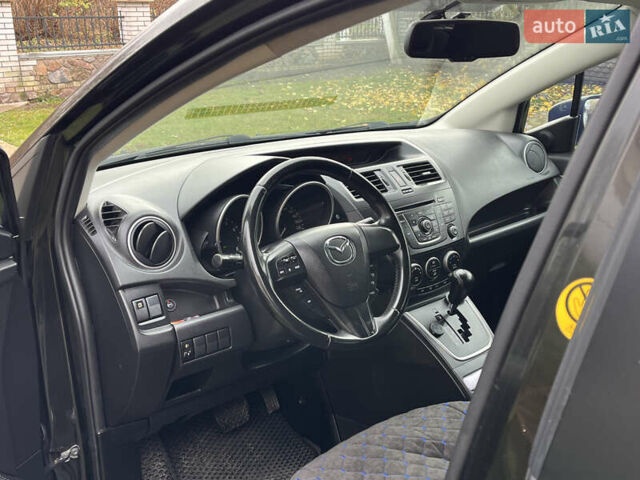 Черный Мазда 5, объемом двигателя 2 л и пробегом 231 тыс. км за 7699 $, фото 1 на Automoto.ua