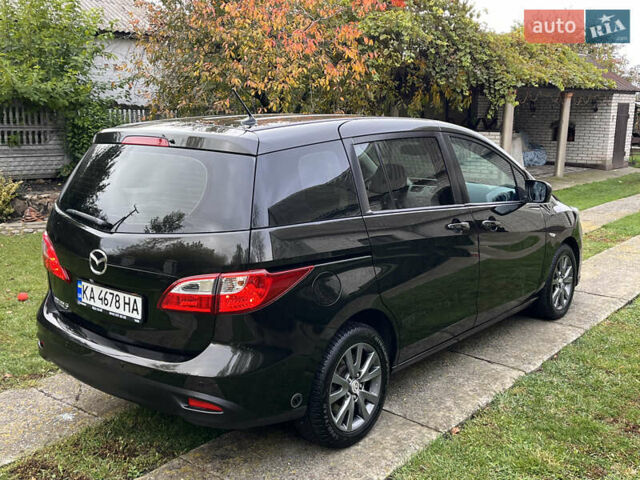 Мазда 5 2010 у Києві на Automoto.ua Чорний Мазда 5, об'ємом двигуна 2 л та пробігом 218 тис. км за 7999 $, фото 31 на Automoto.ua