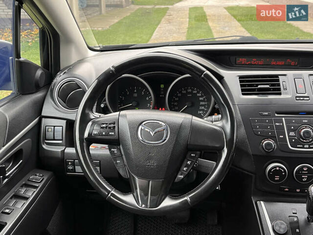 Мазда 5 2010 у Києві на Automoto.ua Чорний Мазда 5, об'ємом двигуна 2 л та пробігом 218 тис. км за 7999 $, фото 69 на Automoto.ua