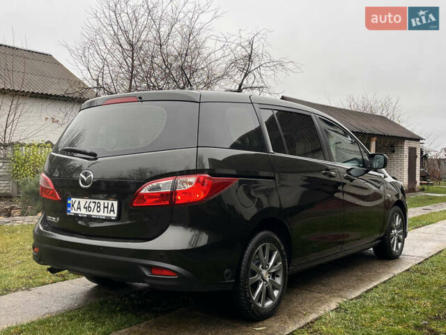 Чорний Мазда 5, об'ємом двигуна 2 л та пробігом 231 тис. км за 7999 $, фото 13 на Automoto.ua