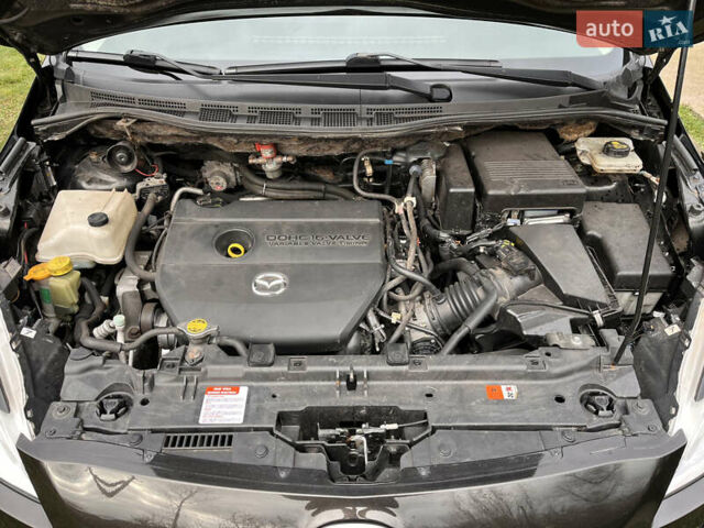 Черный Мазда 5, объемом двигателя 2 л и пробегом 231 тыс. км за 7699 $, фото 40 на Automoto.ua
