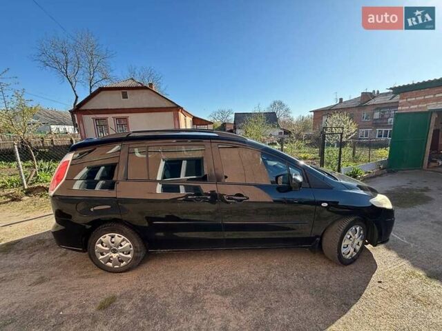 Черный Мазда 5, объемом двигателя 2 л и пробегом 277 тыс. км за 6850 $, фото 3 на Automoto.ua