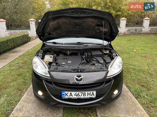Черный Мазда 5, объемом двигателя 2 л и пробегом 231 тыс. км за 7999 $, фото 98 на Automoto.ua