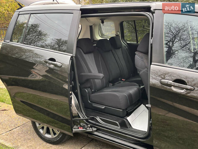 Черный Мазда 5, объемом двигателя 2 л и пробегом 231 тыс. км за 7999 $, фото 80 на Automoto.ua