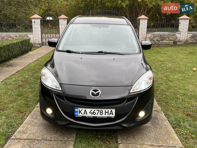 Мазда 5 2010 у Києві на Automoto.ua Чорний Мазда 5, об'ємом двигуна 2 л та пробігом 218 тис. км за 7999 $, фото 12 на Automoto.ua