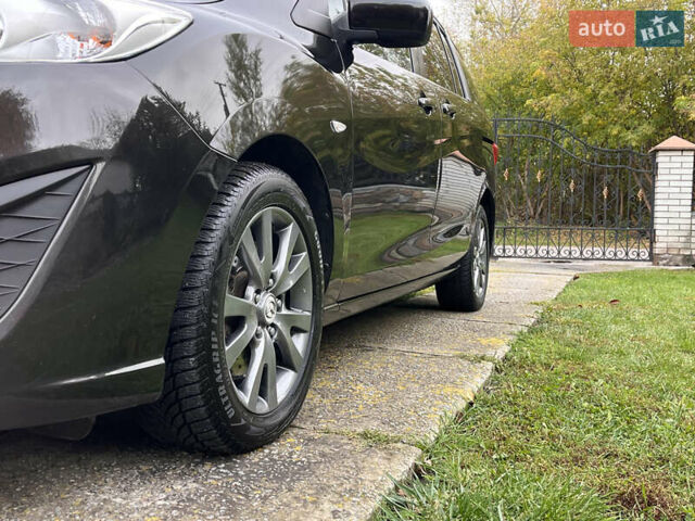 Мазда 5 2010 у Києві на Automoto.ua Чорний Мазда 5, об'ємом двигуна 2 л та пробігом 218 тис. км за 7999 $, фото 38 на Automoto.ua