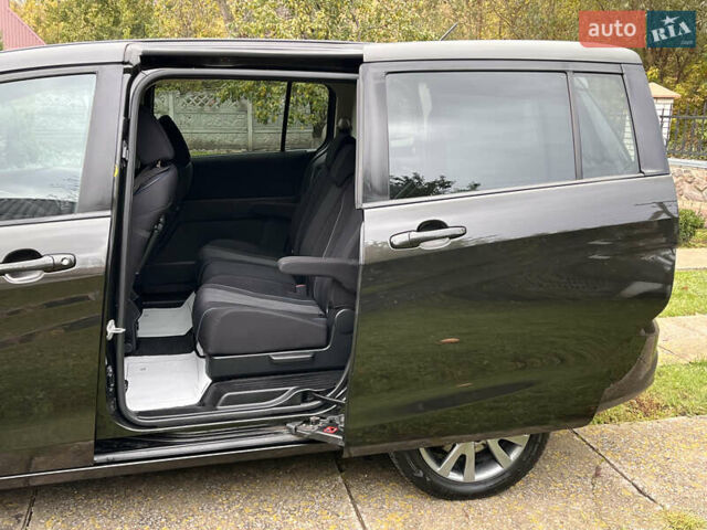 Черный Мазда 5, объемом двигателя 2 л и пробегом 231 тыс. км за 7999 $, фото 61 на Automoto.ua