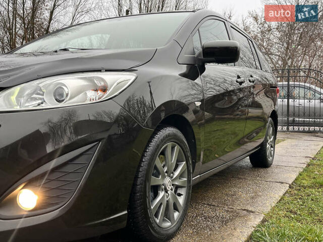 Чорний Мазда 5, об'ємом двигуна 2 л та пробігом 231 тис. км за 7999 $, фото 22 на Automoto.ua