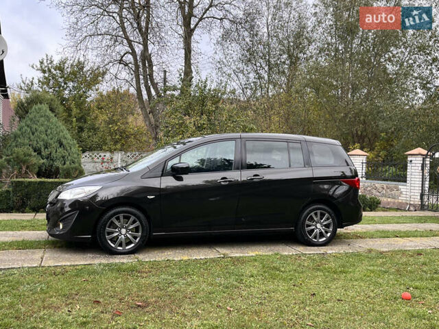 Черный Мазда 5, объемом двигателя 2 л и пробегом 231 тыс. км за 7999 $, фото 21 на Automoto.ua