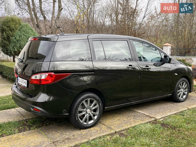 Черный Мазда 5, объемом двигателя 2 л и пробегом 231 тыс. км за 7699 $, фото 16 на Automoto.ua
