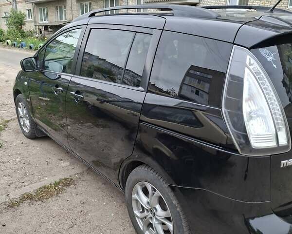 Черный Мазда 5, объемом двигателя 2 л и пробегом 202 тыс. км за 7200 $, фото 1 на Automoto.ua