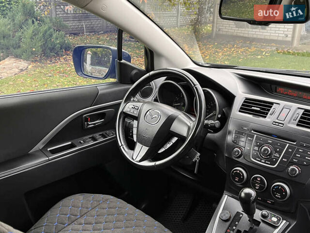 Мазда 5 2010 у Києві на Automoto.ua Чорний Мазда 5, об'ємом двигуна 2 л та пробігом 218 тис. км за 7999 $, фото 84 на Automoto.ua