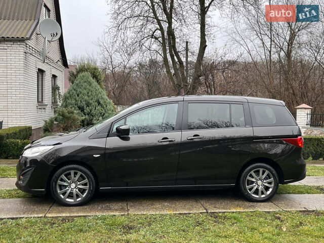 Чорний Мазда 5, об'ємом двигуна 2 л та пробігом 231 тис. км за 7999 $, фото 7 на Automoto.ua