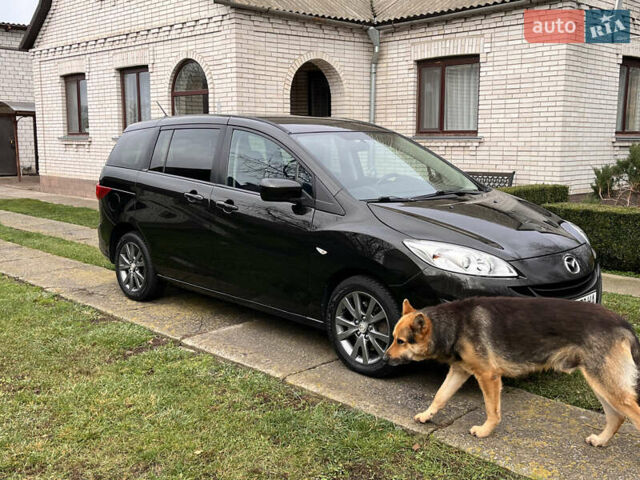 Черный Мазда 5, объемом двигателя 2 л и пробегом 231 тыс. км за 7699 $, фото 17 на Automoto.ua